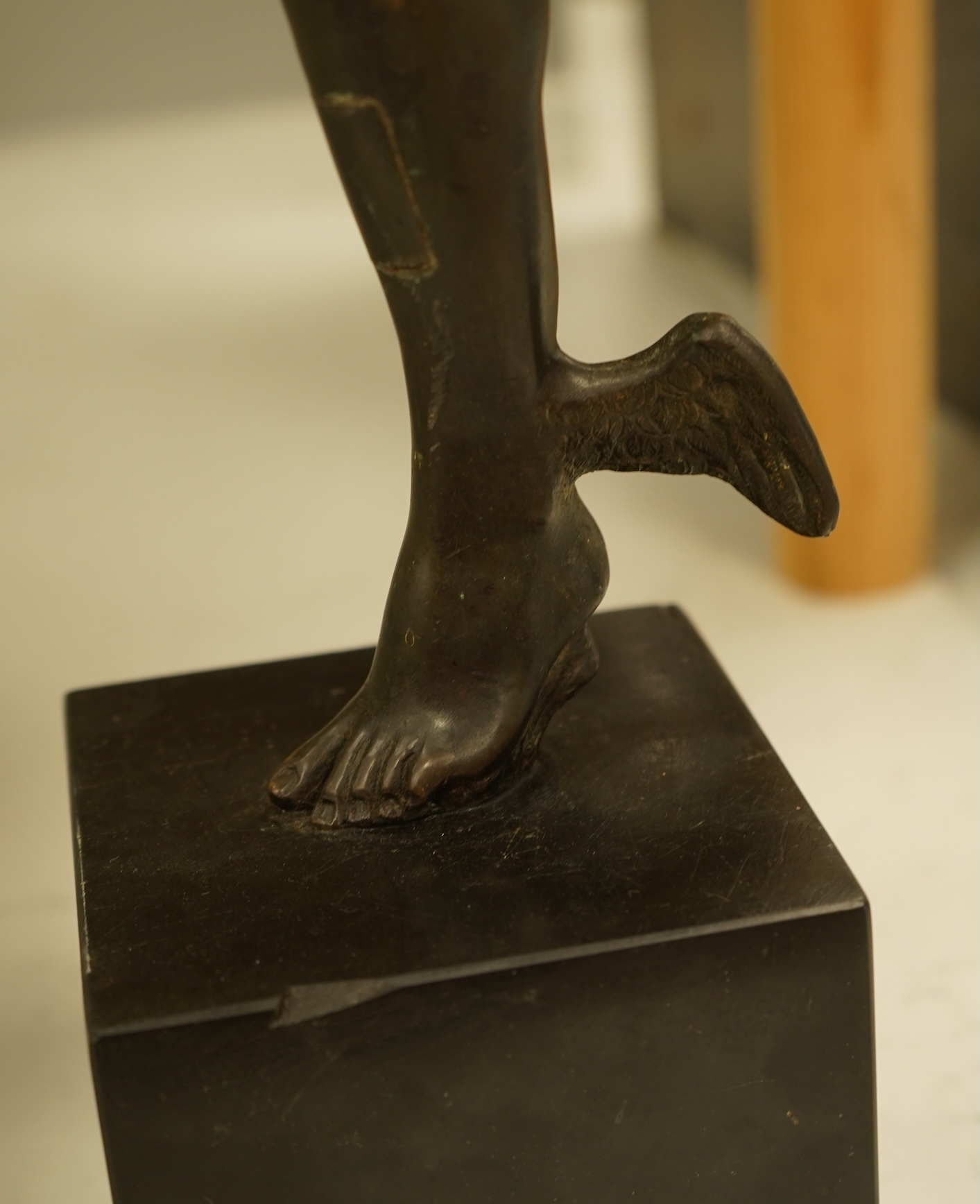 After the antique, a bronze study of Mercury raised on square base, 70cm high